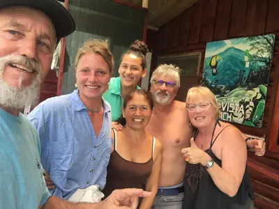 a group of people posing for a picture at Bella Vista Ranch Ecolodge in Turrialba