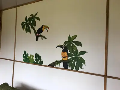 a picture of two birds on a wall at Bella Vista Ranch Ecolodge in Turrialba