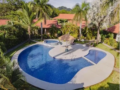 an overhead view of a swimming pool in a resort at Casa Claudia in Potrero