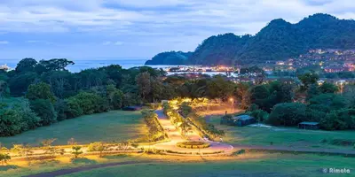 an aerial view of a park with trees and the ocean at Luxury Beach Apartment Herradura Fishermen And Family in Herradura