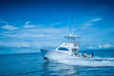 a group of people on a boat in the water at Bella Vista 2C 3 bdrs pool view in Los Suenos in Herradura
