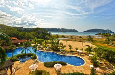 an aerial view of the pool at the resort at Bella Vista 4B 3 bdrs ocean view in Los Suenos in Herradura