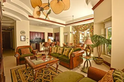 a living room with couches and a table at Bella Vista 4B 3 bdrs ocean view in Los Suenos in Herradura