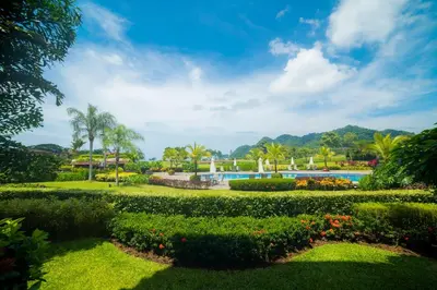 a view of the gardens at the resort at Del Mar 3N 3 bdr Garden View in Los Suenos in Herradura