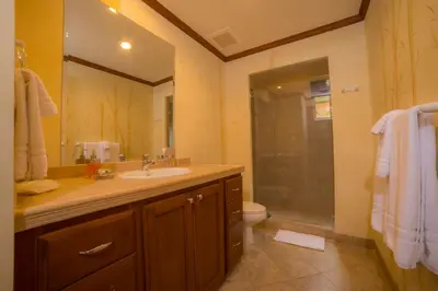 a bathroom with a sink and a shower at Veranda 8F 2 bdr Garden View in Los Suenos in Herradura