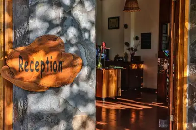 a door with a sign that says recognition on it at Arco Iris Lodge in Monteverde Costa Rica