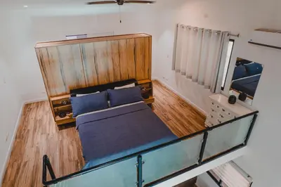 an overhead view of a bed in a room at Peace Lofts and Apartments in Santa Teresa Beach