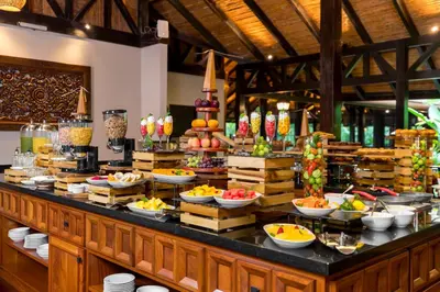 a buffet line with many different types of food at Hideaway Rio Celeste Hotel in Bijagua