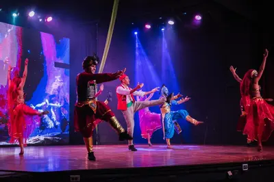 a group of people dancing on a stage at Fiesta Resort All Inclusive Central Pacific - Costa Rica in El Roble