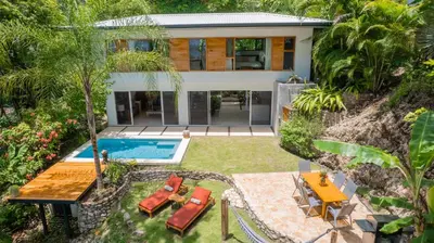 an aerial view of a house with a swimming pool at Villa Makai Santa Teresa in Santa Teresa Beach