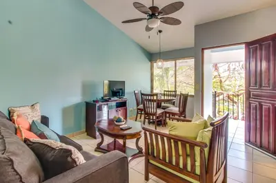 a living room with a couch and a table at Aquamarine 4 in Guanacaste