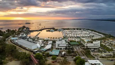 an aerial view of a marina with boats in the water at Boutique Hotel Las Cascadas in Manuel Antonio