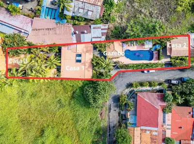 an overhead view of a house with a yard at Villa Jaco Sol 4 bdr resort pool near the beach in Jacó