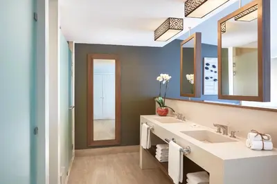 a bathroom with a sink and a mirror at Secrets Papagayo All Inclusive - Adults Only in Papagayo, Guanacaste