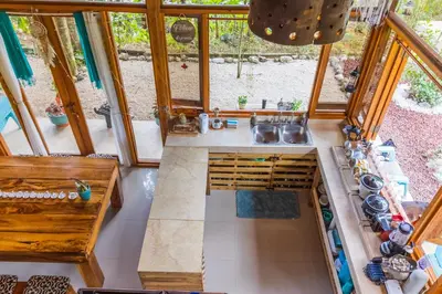 an overhead view of a kitchen in a tiny house at Villas Wanderlust in Puntarenas
