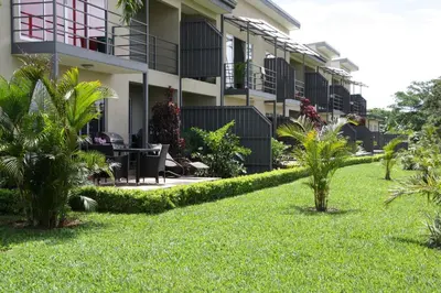 a view of the courtyard of a building at Apartamentos La Alborada Airport SJO in Alajuela City