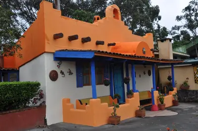 a house constructed out of legos at Mountain Lodge CheTica in San Jerónimo