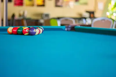 a close up of a pool table at Kayak Lodge in Damas