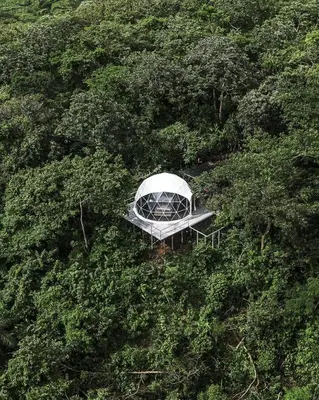 an aerial view of a tent in the middle of a forest at Domos Mirador Romantic Private Honeymoon Glamping in Miramar