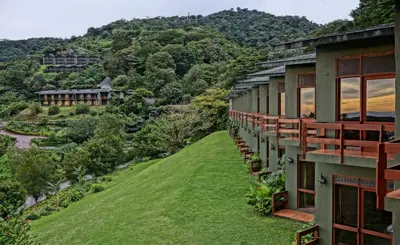 a view of the mountains from the balcony of a resort at El Establo Mountain Hotel in Monteverde Costa Rica