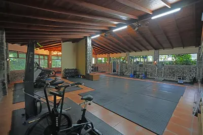 a gym with bikes in the middle of a room at El Establo Mountain Hotel in Monteverde Costa Rica