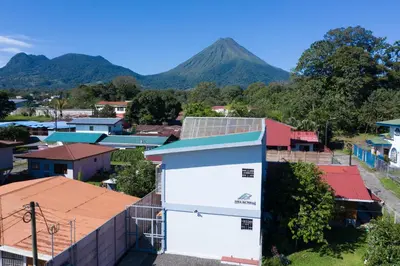 an aerial view of a town with mountains in the background at Apartamentos Equipados RyA del Volcán in Fortuna