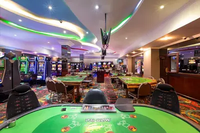 a casino with poker tables at Crowne Plaza San Jose La Sabana by IHG in San José