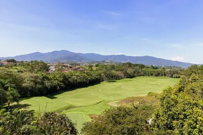an aerial view of a golf green with trees at Costa Rica Marriott Hotel Hacienda Belen in San José