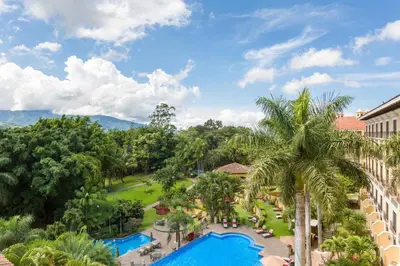 an aerial view of a resort with palm trees at Costa Rica Marriott Hotel Hacienda Belen in San José