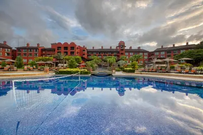 a large swimming pool in front of a building at Los Sueños Marriott Ocean & Golf Resort in Jacó