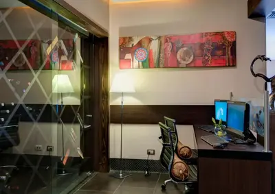 an office with a desk with a computer on it at Studio Hotel Boutique in San José