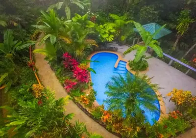 a model of a garden with a swimming pool at Villas en el Bosque in Ojochal