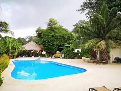 a swimming pool in the middle of a resort at Cabo Velas Estates 30 in Matapalo