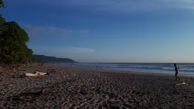 a group of people laying on a beach at Casa SILURI in Santa Teresa Beach
