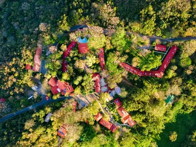 an overhead view of a train yard with trees at Hacienda Guachipelin Volcano Ranch Hotel & Hot Springs in Liberia