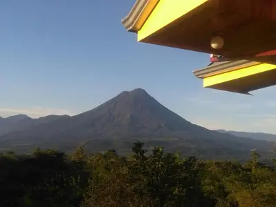 a view of a mountain in the distance at Las Pavitas Arenal Suites in Fortuna