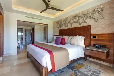 a bedroom with a large bed in a room at Planet Hollywood Costa Rica by Royalton, An Autograph Collection All-Inclusive Resort in Papagayo, Guanacaste