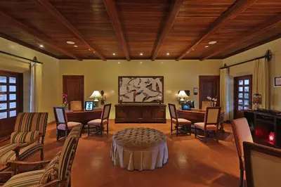 a large living room with a table and chairs at JW Marriott Guanacaste Beach Resort in Tamarindo