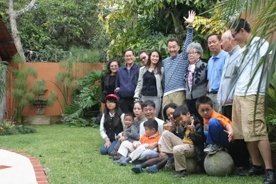 a group of people posing for a picture at Hotel Santa Maria Inn in Alajuela City