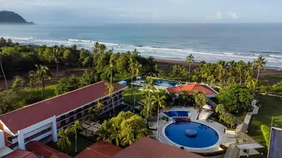 an aerial view of a resort and the ocean at Best Western Jaco Beach All Inclusive Resort in Jacó