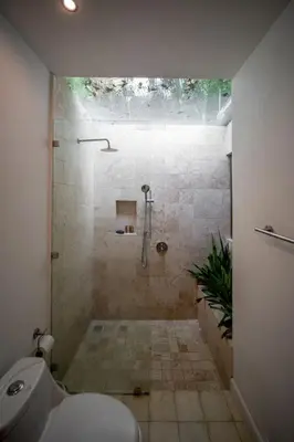 a bathroom with a shower with a toilet at Casa Keshet in Santa Teresa Beach