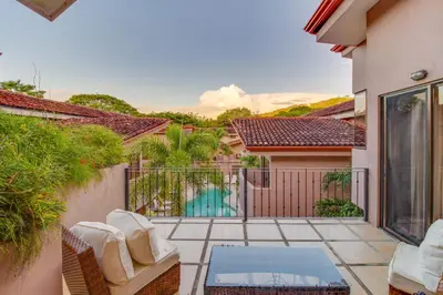 an image of a balcony with a swimming pool at The Cove at Playa Ocotal, units 5,6,7 and 8 in Coco