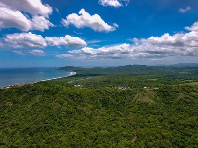an aerial view of a beach and the ocean at Casa del Sol in Tamarindo