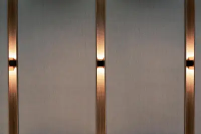a close up of a door with two lights at AC Hotel by Marriott San Jose Escazu in San José