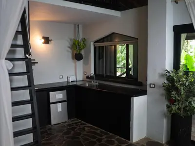 a bathroom with a sink and a mirror at Canaima Chill House in Santa Teresa Beach