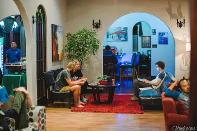a group of people sitting in a room at Hotel Casa Colon in San José