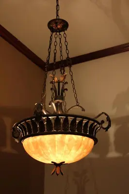 a chandelier hanging from a ceiling at Boutique Hotel Calle 20 in San José