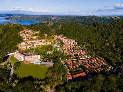 an aerial view of a resort with houses and trees at Villas Sol Beach Resort in Playa Hermosa