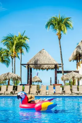 a pool with a toy duck in the water at Margaritaville Beach Resort Playa Flamingo in Playa Flamingo