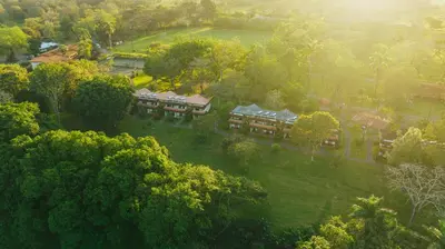 an aerial view of a building in a park at Tilajari Hotel Resort in Fortuna